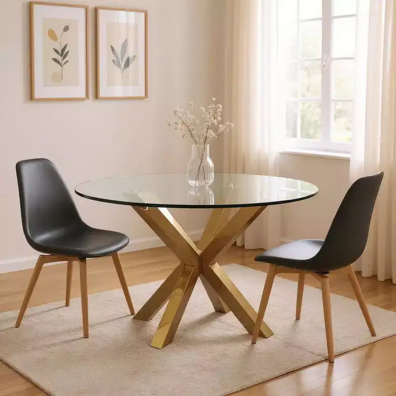 Tavolo da pranzo rotondo trasparente e oro, gambe incrociate, 6 posti